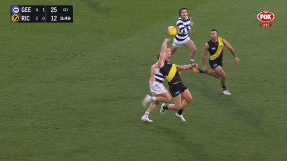 Tom Stewart collides with Dion Prestia.
