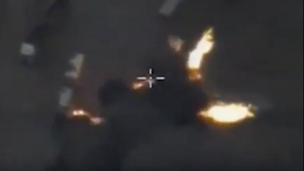 A Syrian government image showing an air strike on oil trucks in Aleppo in 2015.
