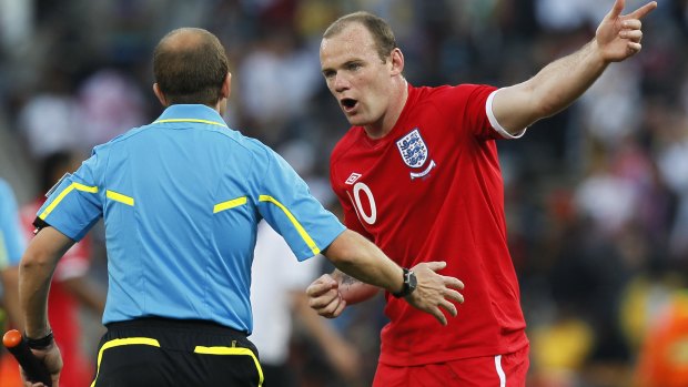 What might have been: England's Wayne Rooney questions assistant referee Pablo Fandino after Frank Lampard's 'ghost goal' in 2010.