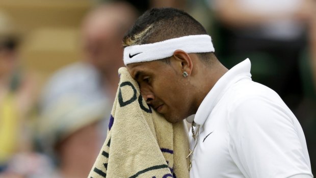 Nick Kyrgios of Australia wipes his face during his match against Richard Gasquet of France at the Wimbledon Tennis Championships in London, July 6, 2015.                REUTERS/Henry Browne