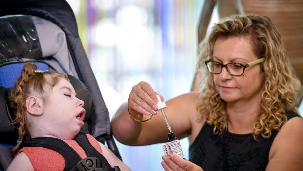 Five-year-old Gemma, who is critically ill, received an early dose of medical cannabis thanks to the Victorian government. This picture was taken at a news conference featuring Premier Daniel Andrews in March 2017.