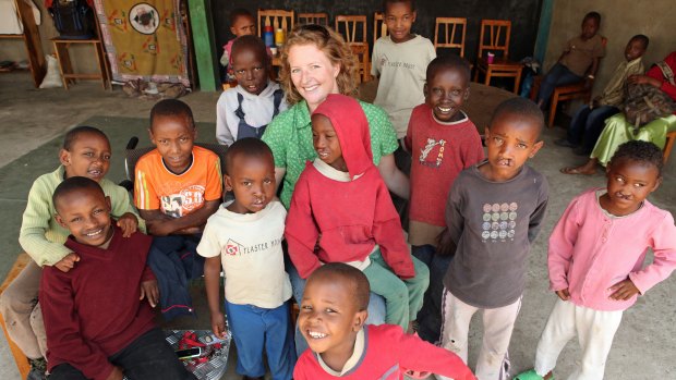 Sarah Rejman pictured in 2010 with child patients of the Plaster House in Arusha, Tanzania, which she founded in 2008. 