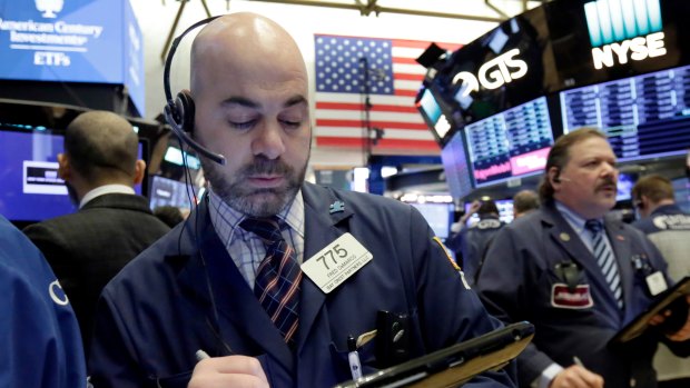 Wall Street fell on Friday but managed to eke out an overall gain for the week.