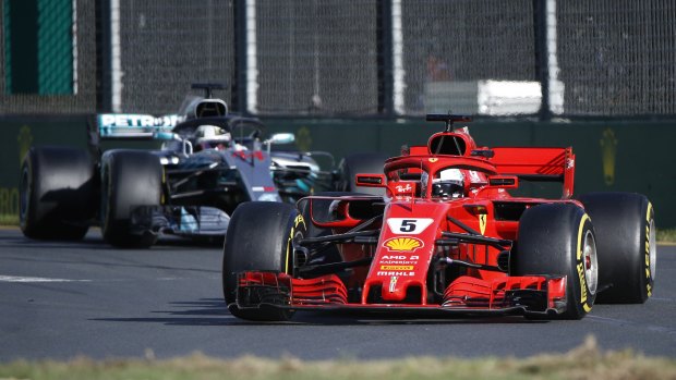 Sebastian Vettel leads Lewis Hamilton with the Briton unable to close the gap after conceding the lead during a pit-stop miscalculation.