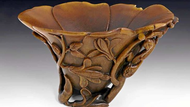 The 'Magnolia and Prunus' libation cup. Made from rhino horn it was bought in an op shop for $4.