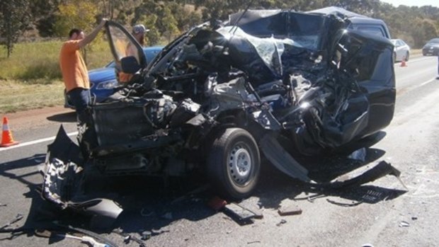 A man was forced to crash into a truck on the Western Freeway to avoid a car driving into oncoming traffic.
