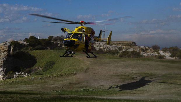 The Westpac Lifesaver Rescue Helicopter landing at Bondi Beach Golf Club