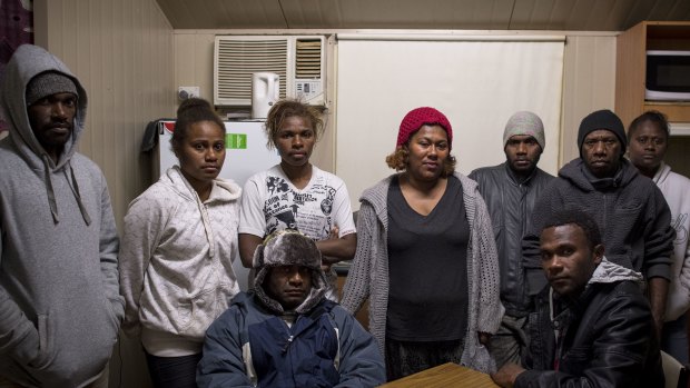 Ms Roqara at a meeting in her caravan with other workers from Vanuatu.