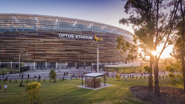 Optus Stadium shines brightest for fans during twilight AFL time.