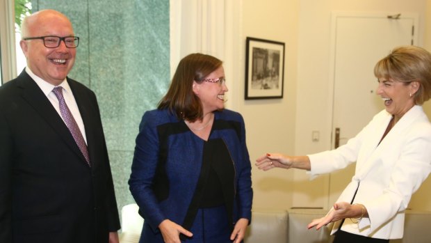 Minister for Women Michaelia Cash congratulates Kate Jenkins on her announcement as the new Sex Discrimination Commissioner with Attorney-General George Brandis at Parliament House on Thursday.