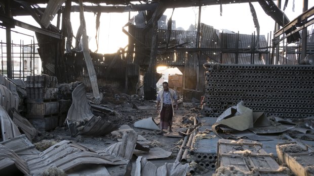 The aftermath of a bombing that destroyed three factories in Sanaa, Yemen, in 2016.