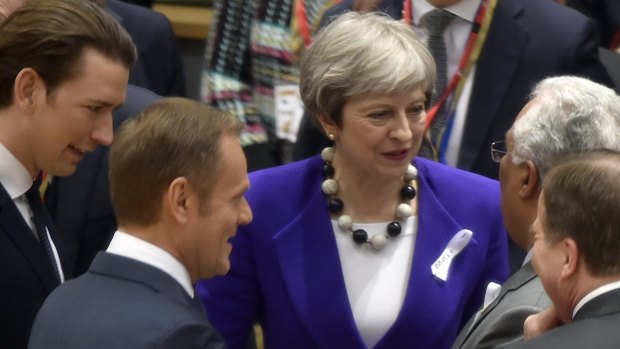 British Prime Minister Theresa May, centre, speaks with from left, Austrian Chancellor Sebastian Kurz, European Council President Donald Tusk, Swedish Prime Minister Stefan Lofven and Portuguese Prime Minister Antonio Costa in Brussels on Thursday.