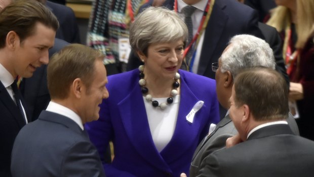 British Prime Minister Theresa May, centre, speaks with from left, Austrian Chancellor Sebastian Kurz, European Council President Donald Tusk, Swedish Prime Minister Stefan Lofven and Portuguese Prime Minister Antonio Costa in Brussels on Thursday.