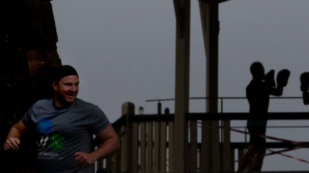 People exercise at Observatory Hill, which had more rain in one day than it had in January.