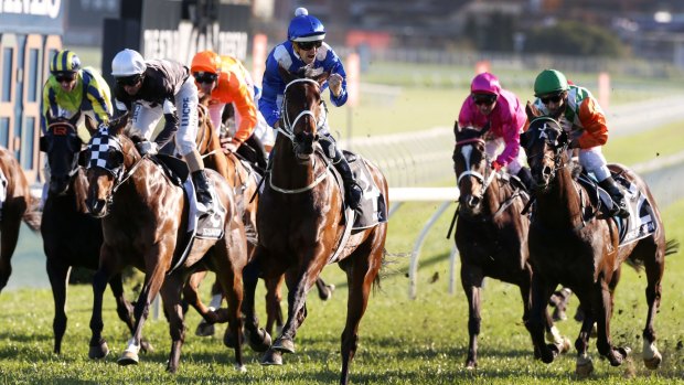 Out for eight: Hugh Bowman wins the Epsom on Winx.