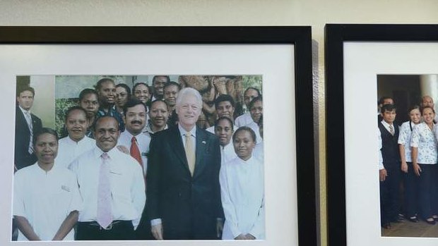 Photos of dignitaries who have visited the PM's hotel in PNG. Photo: Alex Ellinghausen