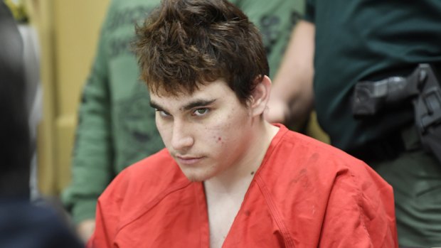 Florida school shooting suspect Nikolas Cruz looks up while in court for a hearing in Fort Lauderdale, Florida.