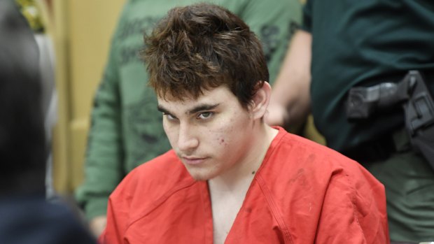 Florida school shooting suspect Nikolas Cruz, looks up while in court for a hearing in Fort Lauderdale, Florida.