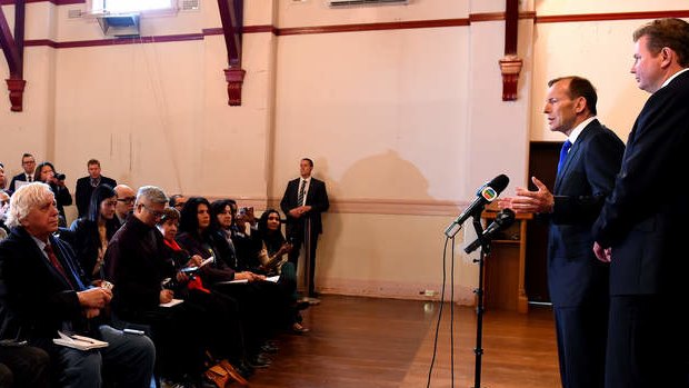 Prime Minister Tony Abbott speaks with members of Australia's multicultural media during a question and answer session, at Strathfield Town Hall, in Sydney.