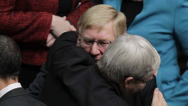 Kevin Rudd embraces former minister Martin Ferguson.