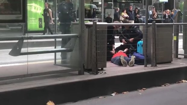 Police made the dramatic arrest on Collins Street.
