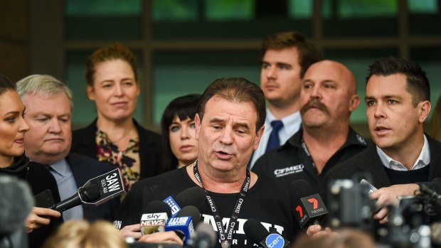 Charges against CFMMEU secretary John Setka (centre) and his deputy Shaun Reardon (second from right) were dropped on May 16.