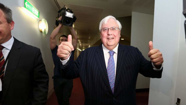 Palmer United Party leader Clive Palmer departs after addressing the media during a press conference in the press gallery. Photo: Alex Ellinghausen