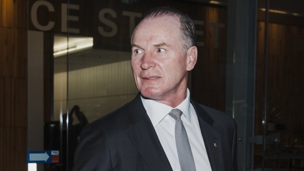Former Wallabies captain turned Bell Potter managing director Simon Poidevin leaving the Administrative Appeals Tribunal.