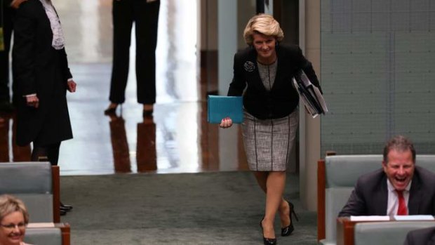Foreign Affairs minister Julie Bishop bows as she was mistakenly announced as a new member during question time. Photo: Andrew Meares
