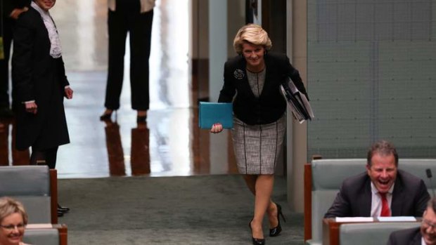 Foreign Affairs minister Julie Bishop bows as she was mistakenly announced as a new member during question time. Photo: Andrew Meares