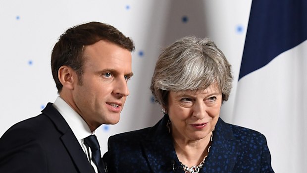 Theresa May, UK prime minister, right, and Emmanuel Macron, France's president in January.