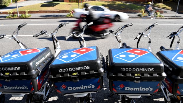Domino's shares fell on the double downgrade. 