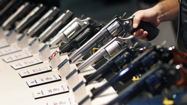 Handguns are displayed at a Las Vegas trade show.