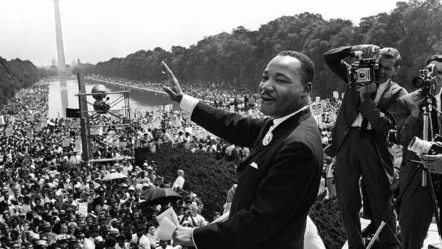 Martin Luther King waves to supporters after delivering his famous 'I have a dream' speech on August 28, 1963.