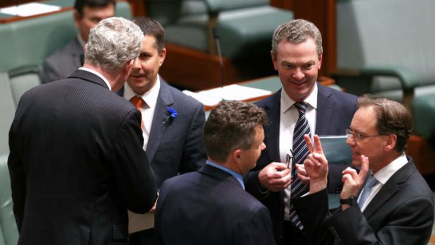 Manager of Opposition Business Tony Burke, Labor MP Mark Butler, Labor MP Matt Thistlethwaite, Leader of the House Christopher Pyne and Environment Minister Greg Hunt in discussion after a division in the House of Representatives on the Minerals Resource Rent Tax Repeal. Photo: Alex Ellinghausen