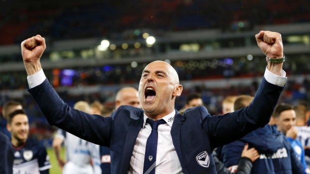 Kevin Muscat enjoys the grand final win.