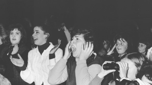 Where's Molly? Beatles fans scream as the Liverpudlians played Festival Hall in 1964.