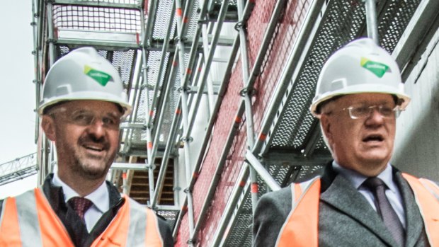 Vice-chancellor Professor Brian Schmidt and ACT Chief Minister Andrew Barr tour the ANU Kambri development site in construction.