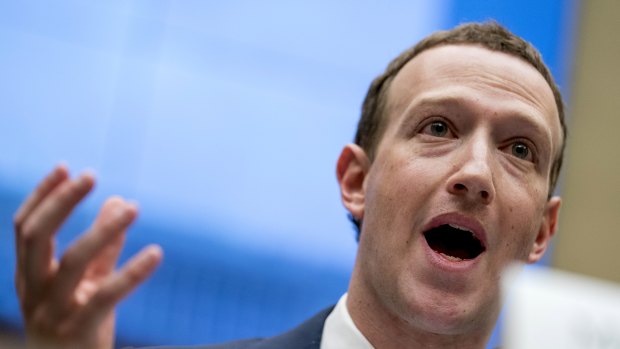 Facebook CEO Mark Zuckerberg testifies before a House Energy and Commerce hearing on Capitol Hill in Washington, Wednesday, April 11, 2018, about the use of Facebook data to target American voters in the 2016 election and data privacy. 