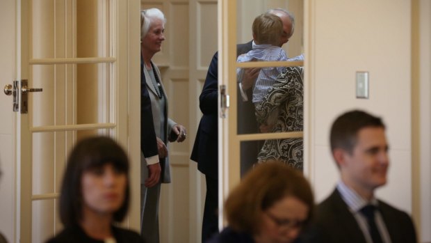 Malcolm Turnbull kisses his grandson,  Jack,  moments before he was sworn in as Prime Minister at Government House on Tuesday.