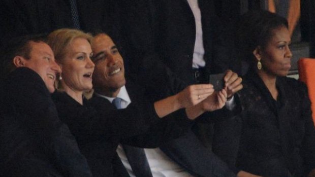 Selfie: Barack Obama and David Cameron pose for a picture with Denmark's Prime Minister Helle Thorning Schmidt.