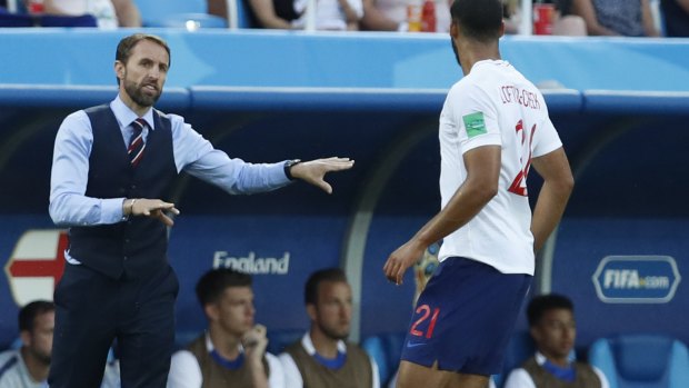 Fashion statement: England manager Gareth Southgate in his trademark outfit. 