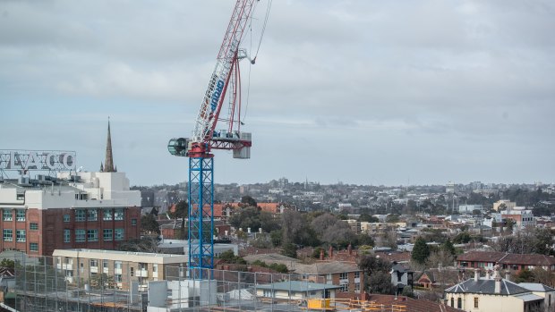 Hundreds have been evacuated in Richmond as strong winds damage a crane looming above Bridge Road.