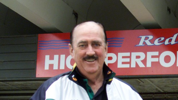 Ken Wood outside his swimming academy in Redcliffe, pictured in September 2001.