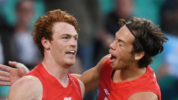 Stepping up: Gary Rohan (left) may have to play as the Swans' tallest forward.