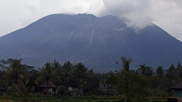 Mount Agung spews volcanic ash into the air.