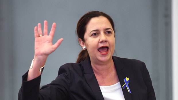 Queensland Premier Annastacia Palaszczuk gestures during question time.