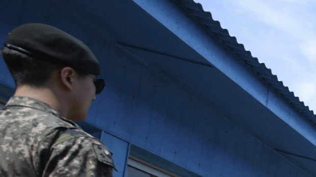 South Korean soldiers stand guard in the Demilitarised Zone.