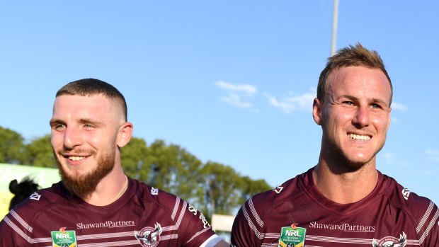 Happier times: Hastings and Cherry-Evans celebrate at Brookvale.