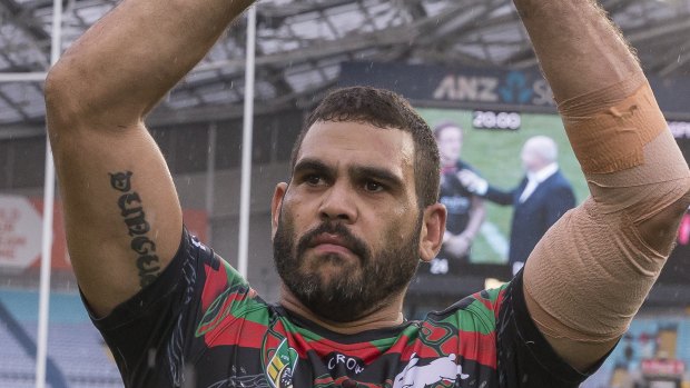 Grateful: Greg Inglis applauds the Rabbitohs fans after their upset win over the Dragons.